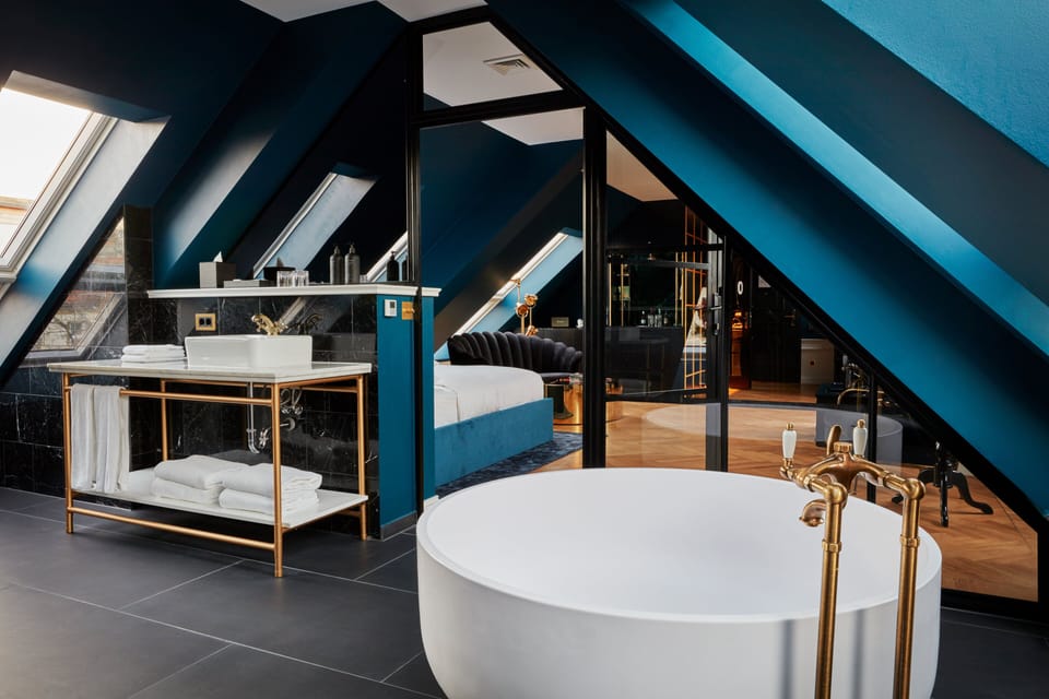 Maison Suite | Bathroom | Shower, designer toiletries, hair dryer, bathrobes