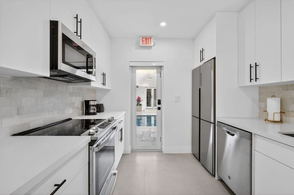 Dine, cook, and step right out to the pool—seamless indoor-outdoor flow.