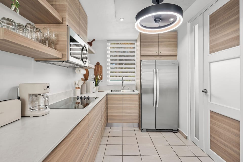 Apartment, Balcony, Pool View | Private kitchen