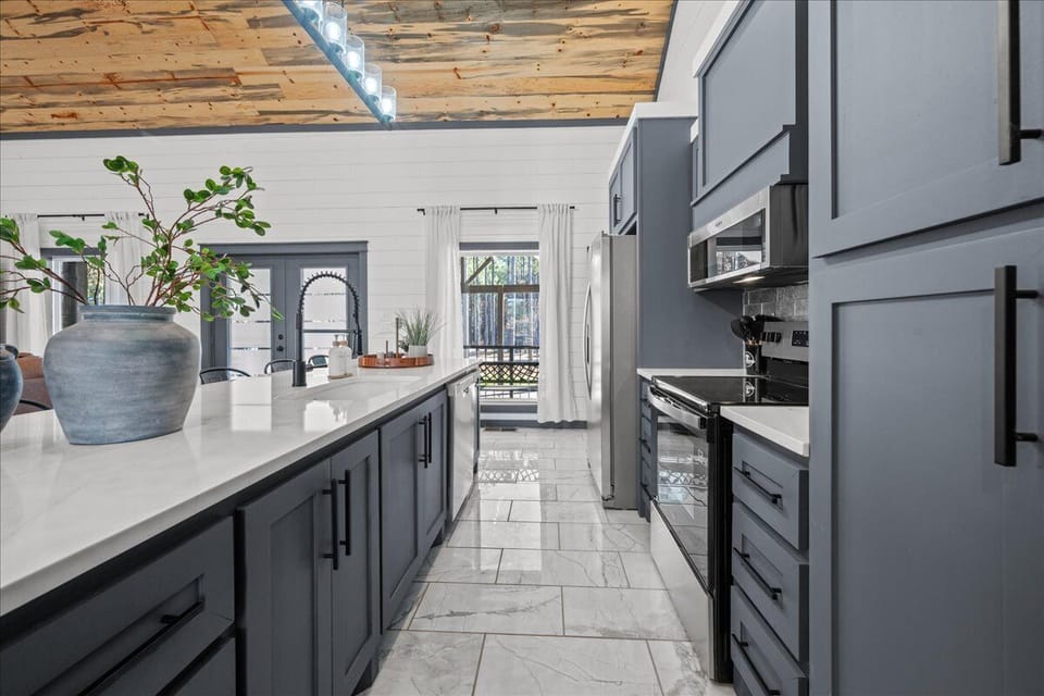 Functional kitchen corridor with modern appliances 