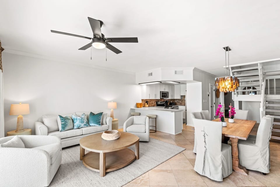 Gulf front open concept layout with balcony access overlooking private beach. 