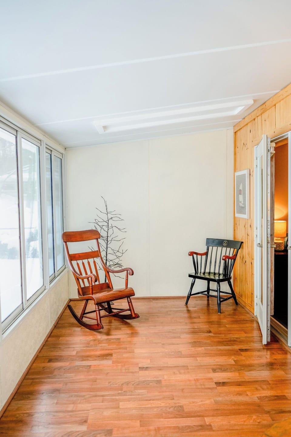 Sunroom off the master bedroom and access to the private backyard.