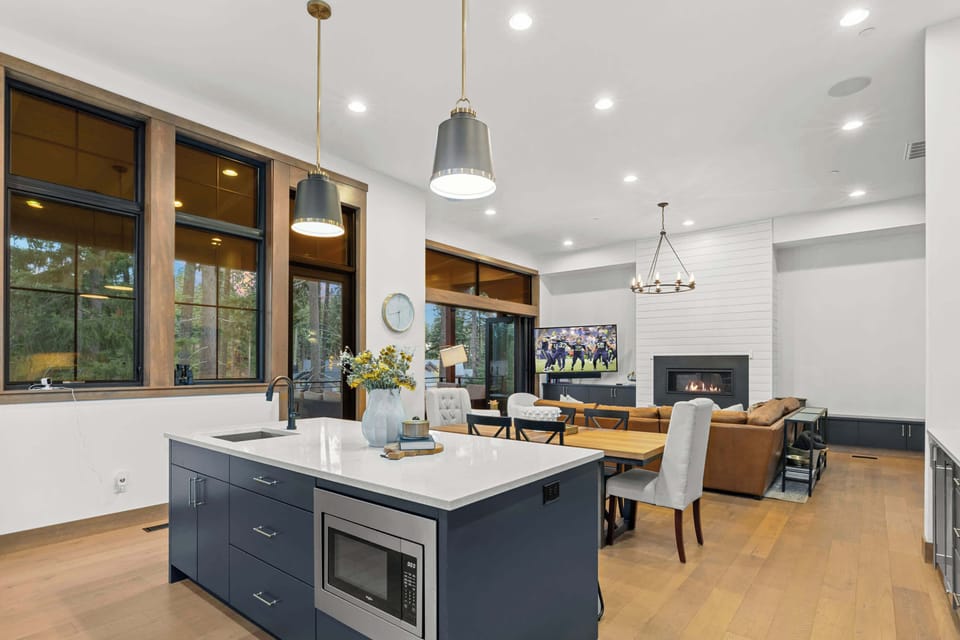 Open kitchen and living area designed for entertaining and relaxing together.