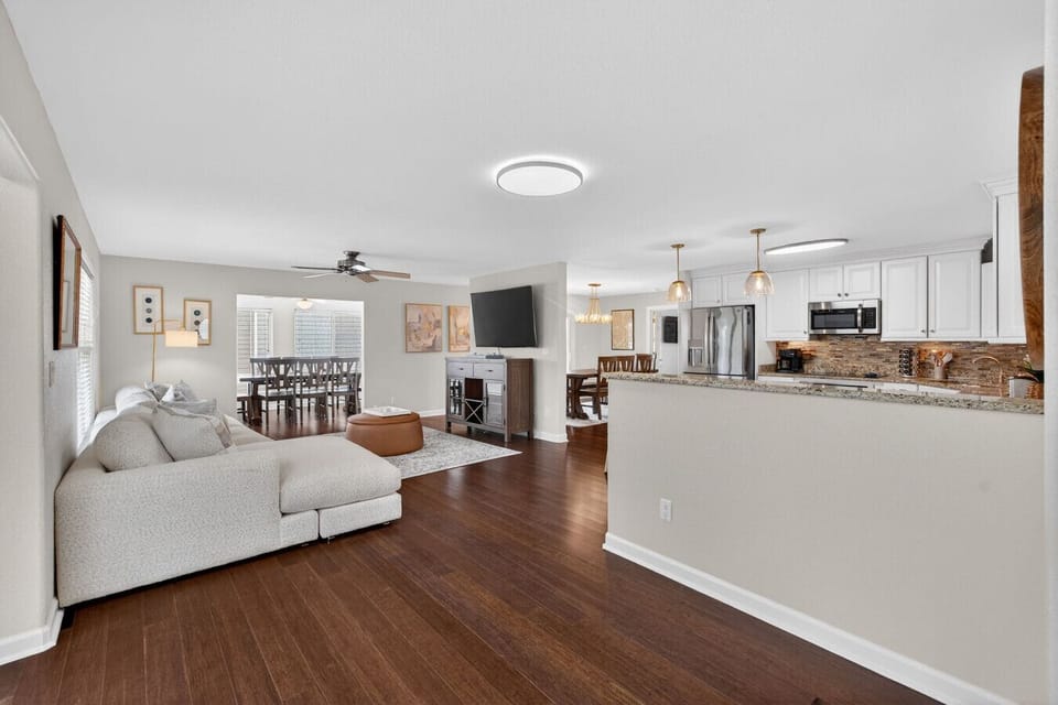 Bright open-concept living space perfect for relaxing, dining, and gathering together.
