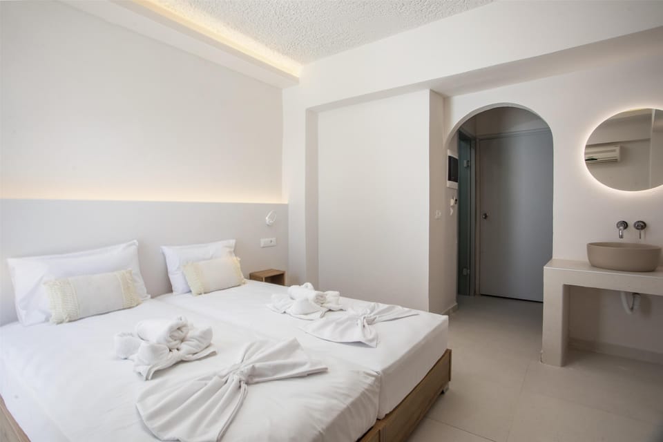 Deluxe Double Room | Blackout drapes, iron/ironing board, free WiFi, bed sheets