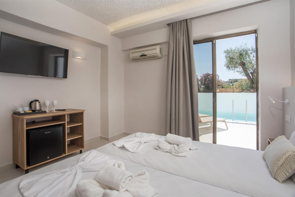Deluxe SwimUp Shared Pool | Blackout drapes, iron/ironing board, free WiFi, bed sheets
