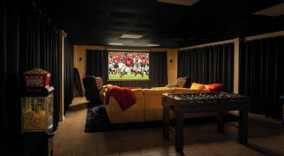 When the lights go down, the fun turns up—games & movie chills all in one room.