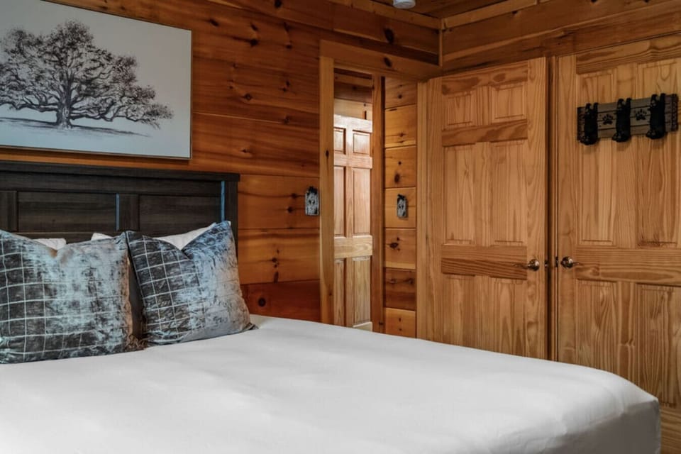 Main level queen bedroom with a TV and luxury linens!