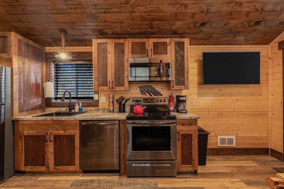 Kitchen and living room area is spacious for it being a tiny house.