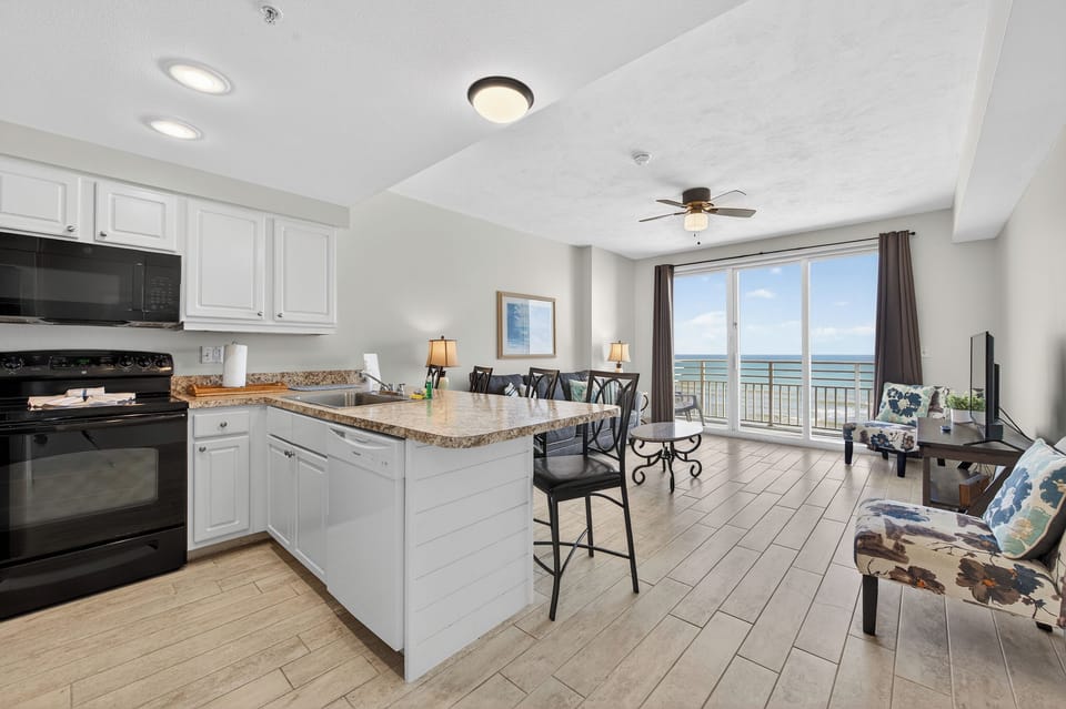 Views into kitchen and living room