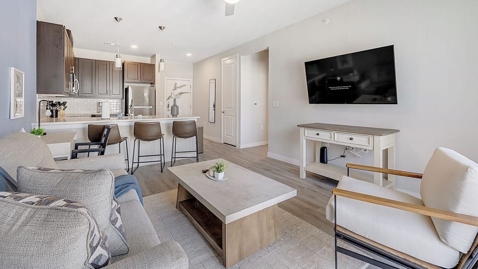 Apartment (1 Bedroom) | Living area | 50-inch Smart TV with digital channels