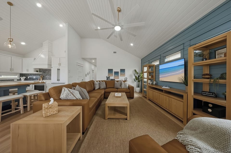 Coastal-chic comfort, open-concept living area made for the whole crew.