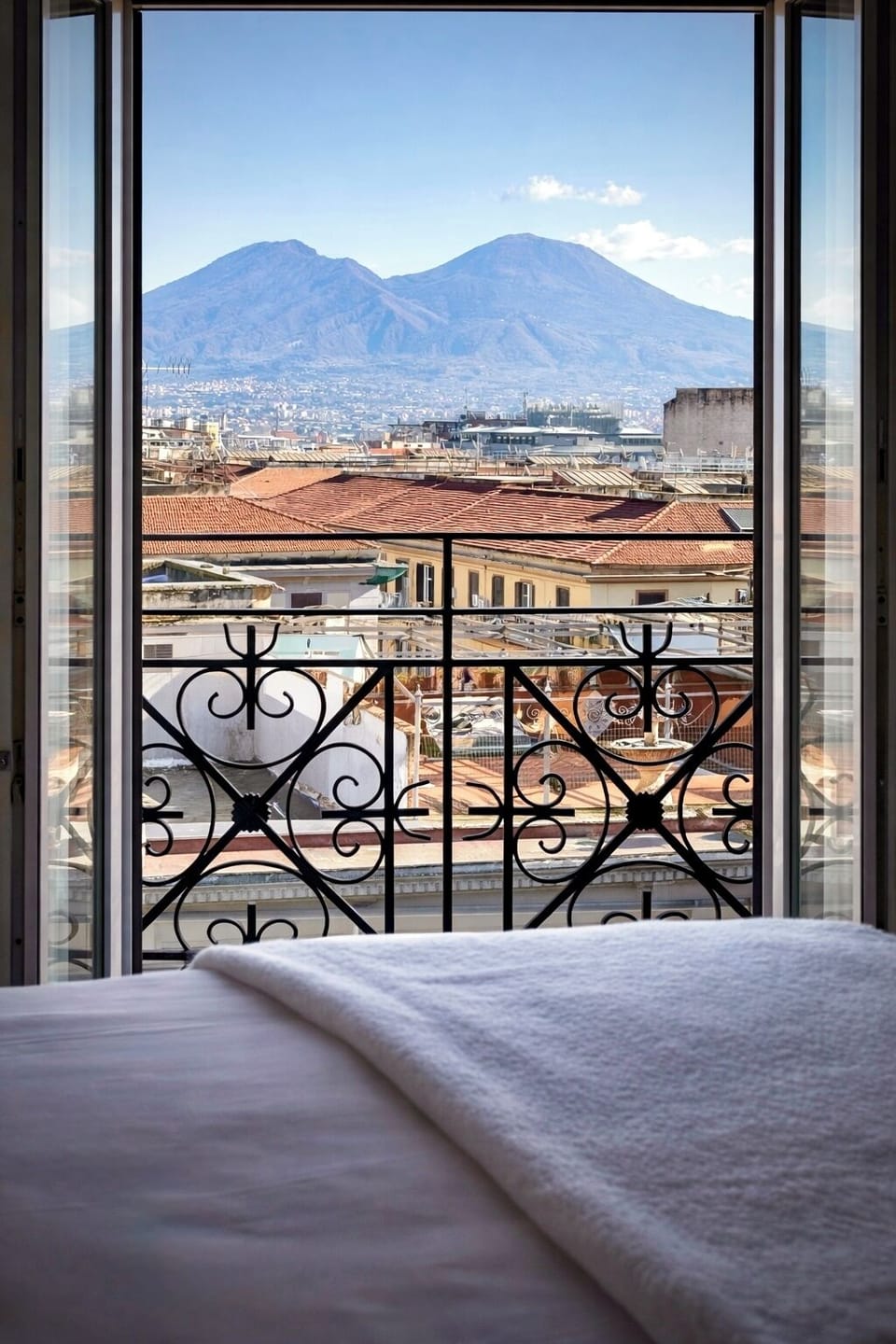 Deluxe Double Room, Balcony, Mountain View | Minibar, in-room safe, desk, laptop workspace