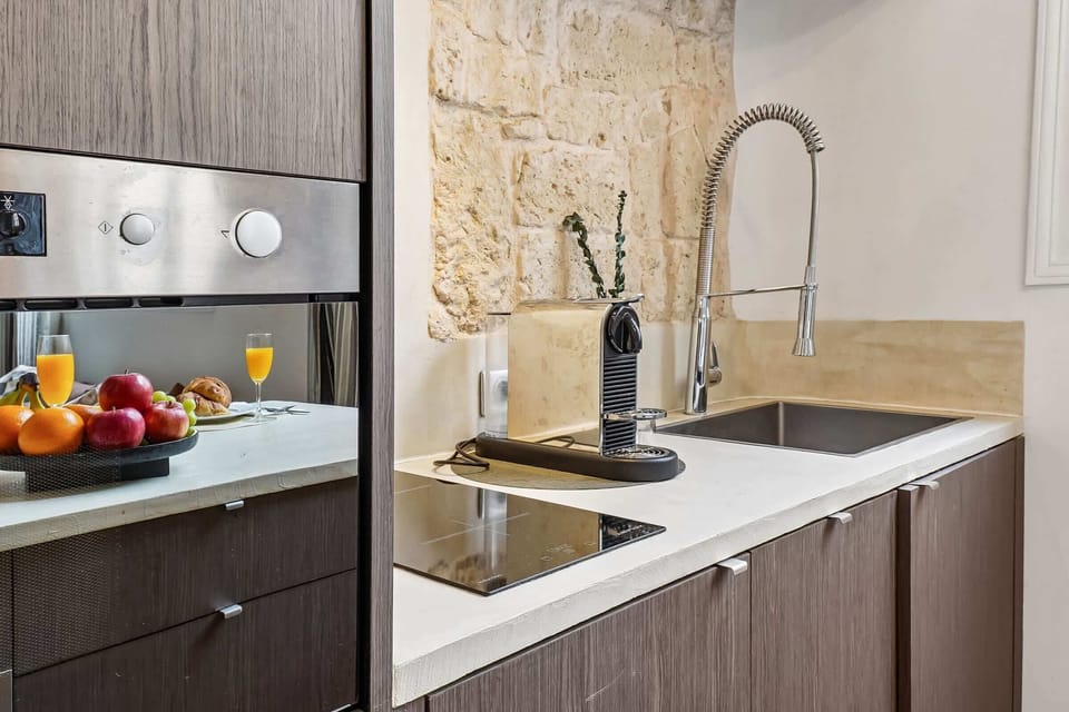 The kitchen is fully equipped to prepare a simple meal 