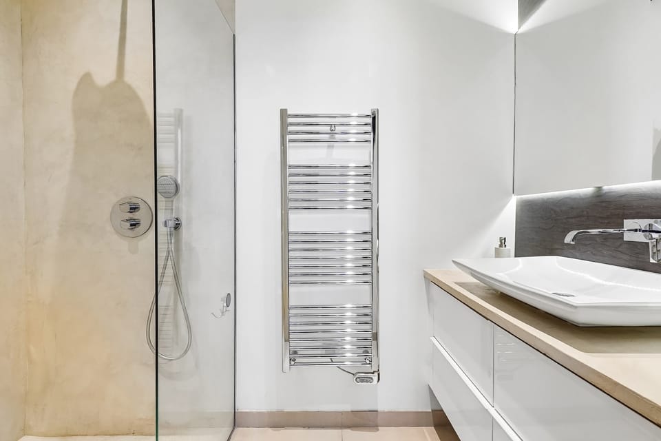 The bathroom with shower