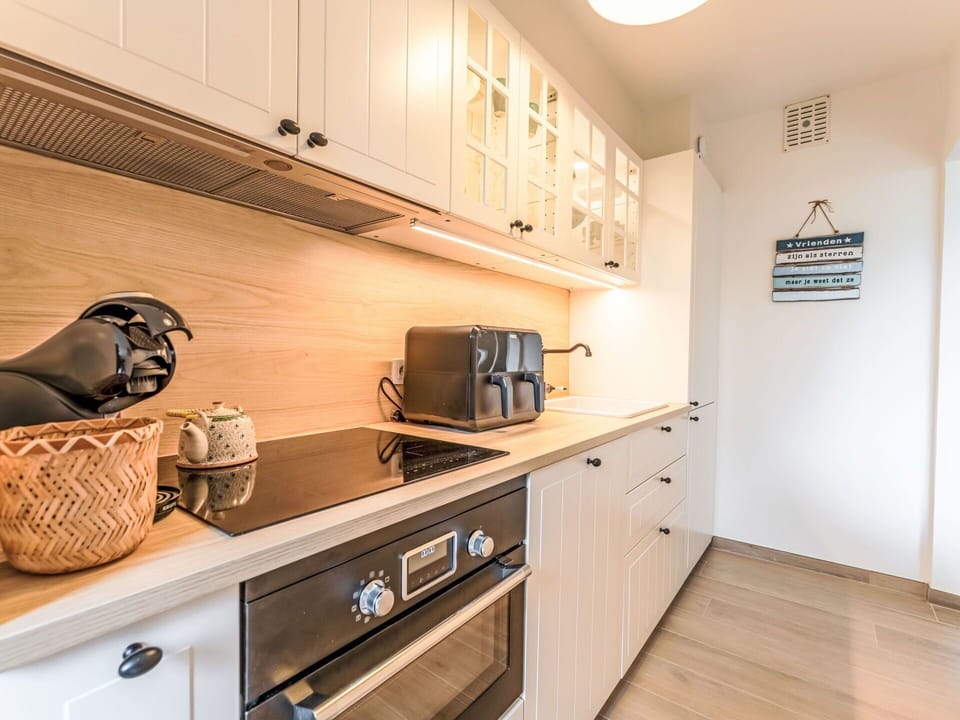 Kitchen Appliance, Countertop, Kitchen, Cabinetry, Interior Design, Furniture, Flooring, Major Appliance, Wood, Home Appliance