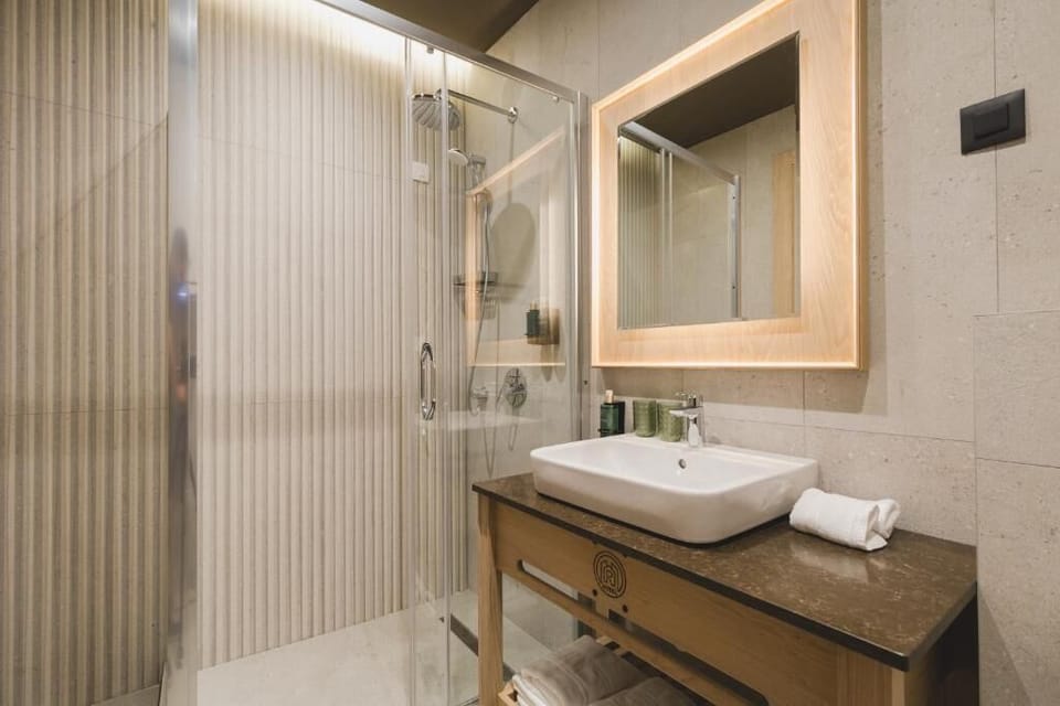 Family Apartment, Mountain View | Bathroom | Shower, slippers, towels