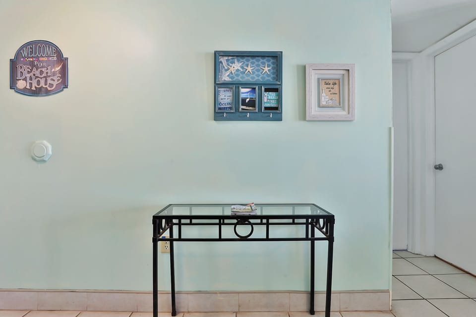 Entryway table for placing keys and personal items.