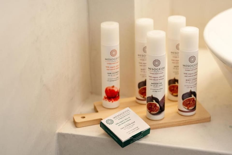Suite, 2 Bedrooms, Balcony | Bathroom amenities | Hair dryer, slippers, towels, soap