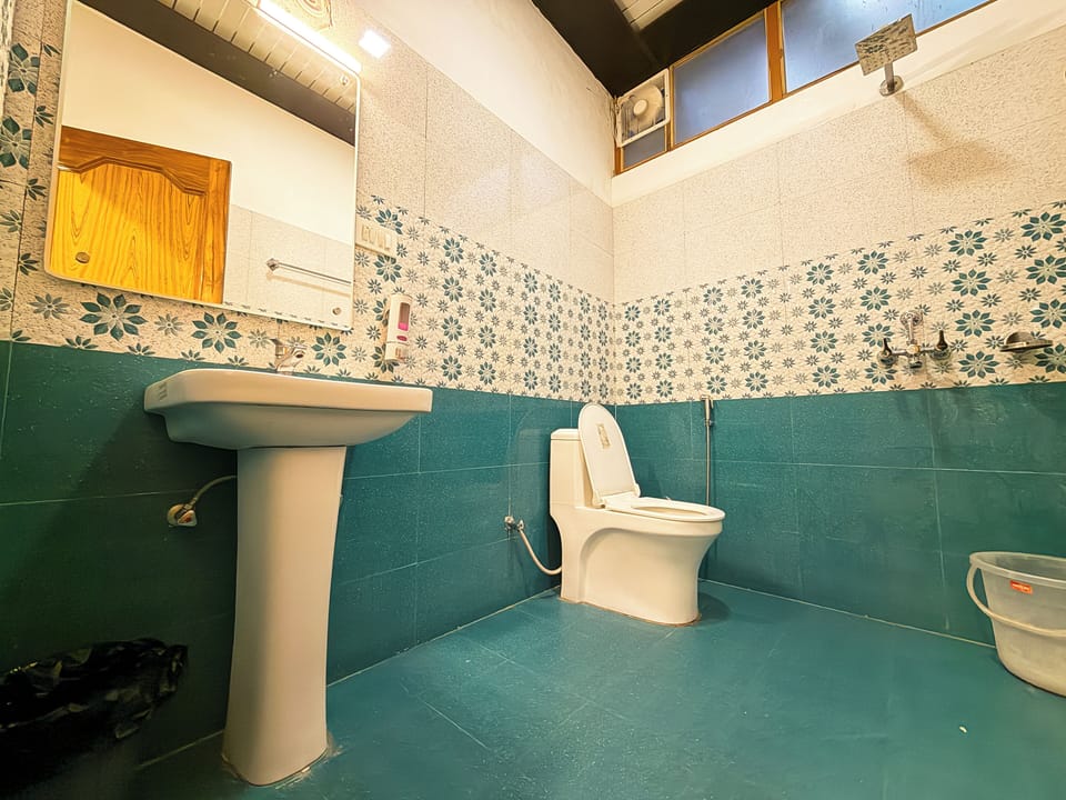 Shower, slippers, towels, soap