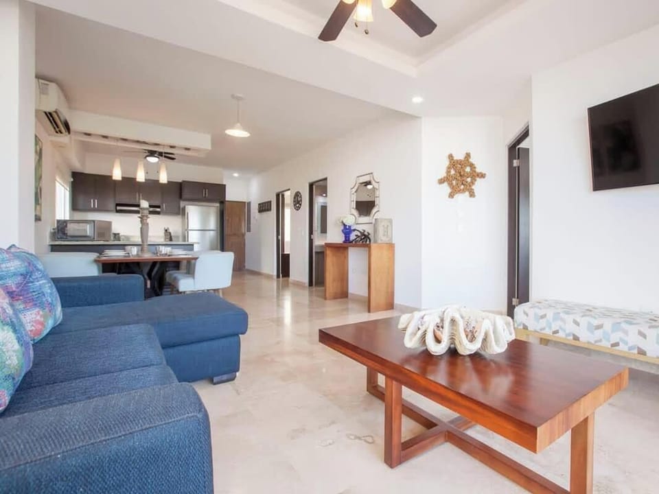 A wonderfully wide open LIVING AREA with lots of natural light
