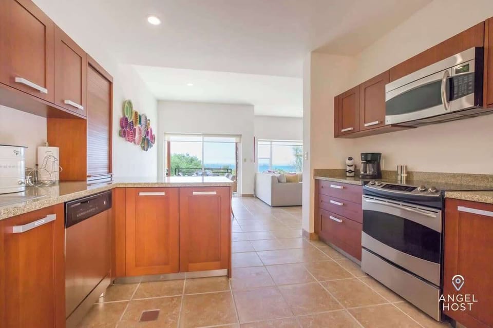 Well-equipped kitchen designed for cooking at home.