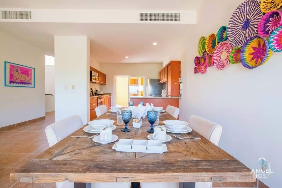 Dining table for four with Mexican décor accents.