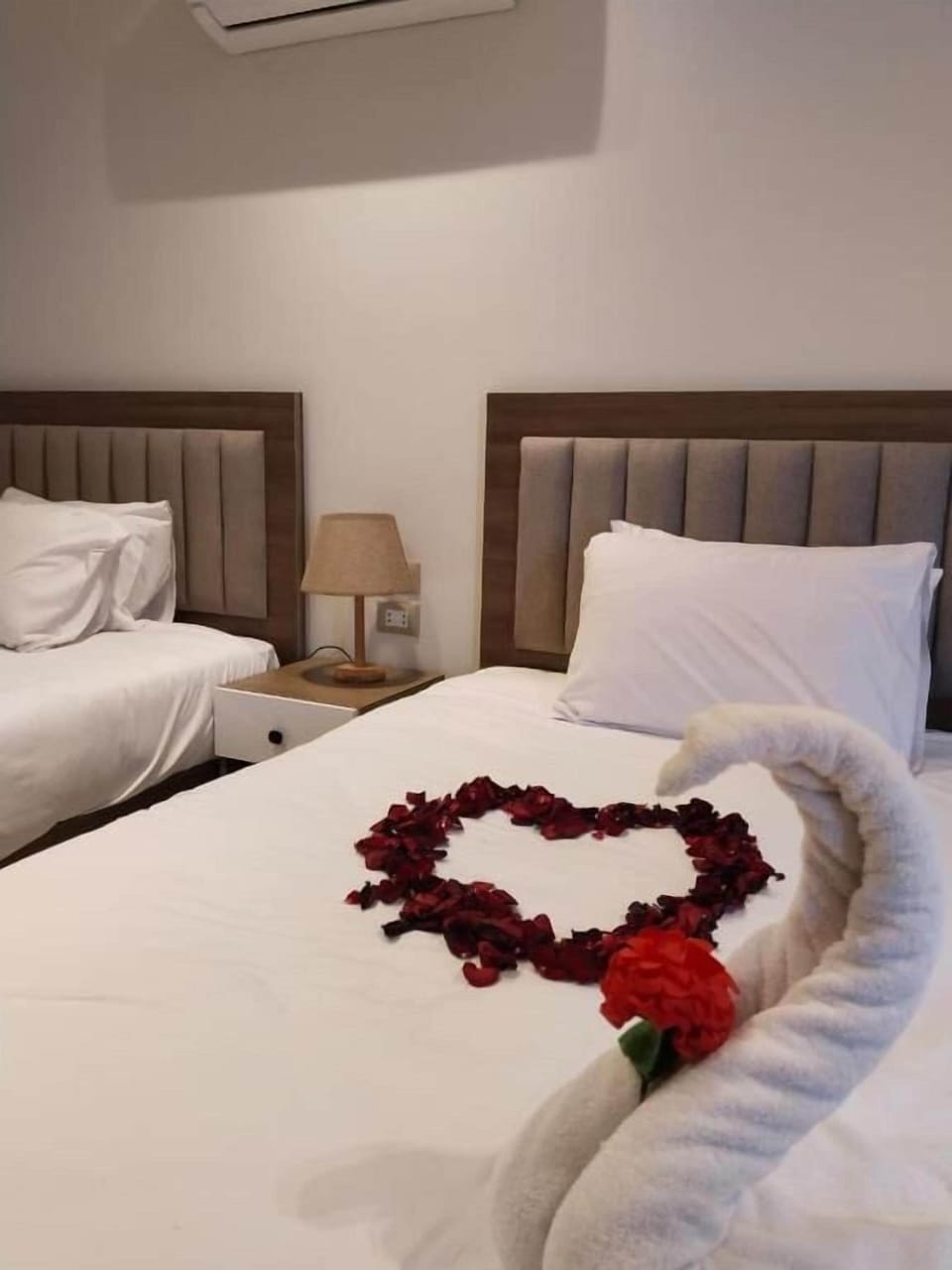 Deluxe Quadruple Room, City View | In-room safe, blackout drapes, soundproofing, iron/ironing board