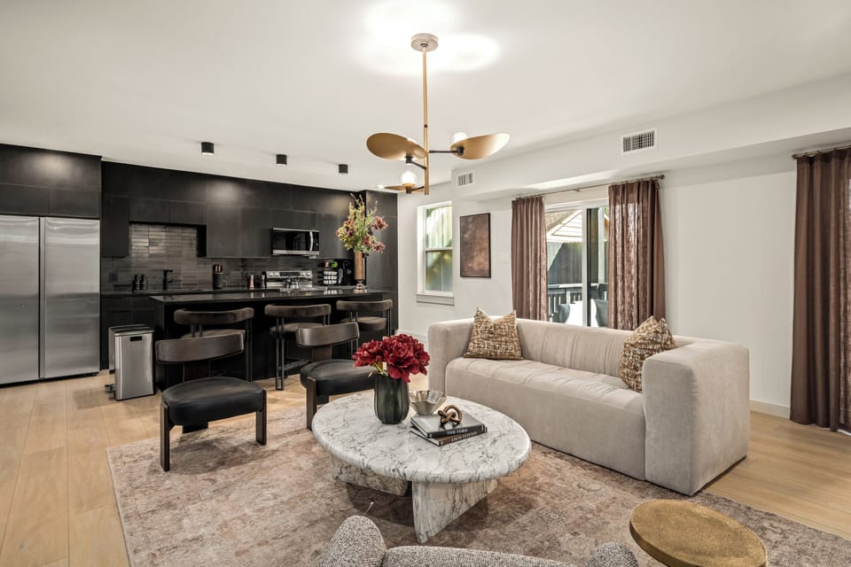 Enjoy this ample living room, that seamless flow from the lounge to kitchen. 
