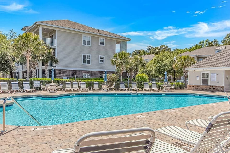 Resort-Style Pool & Lounge Area
Large community pool with plenty of seating for soaking up the sun.