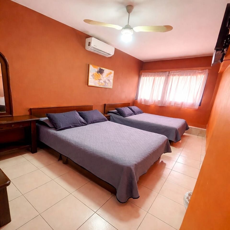 Classic Room, 2 Double Beds | WiFi (free), bed sheets