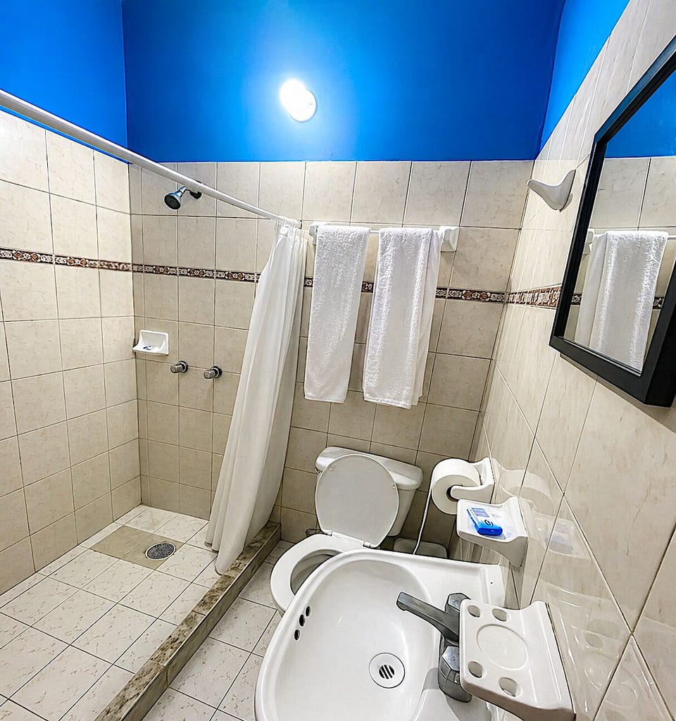 Classic Room, 2 Double Beds | Bathroom | Shower, heated floors (bathroom), towels, soap