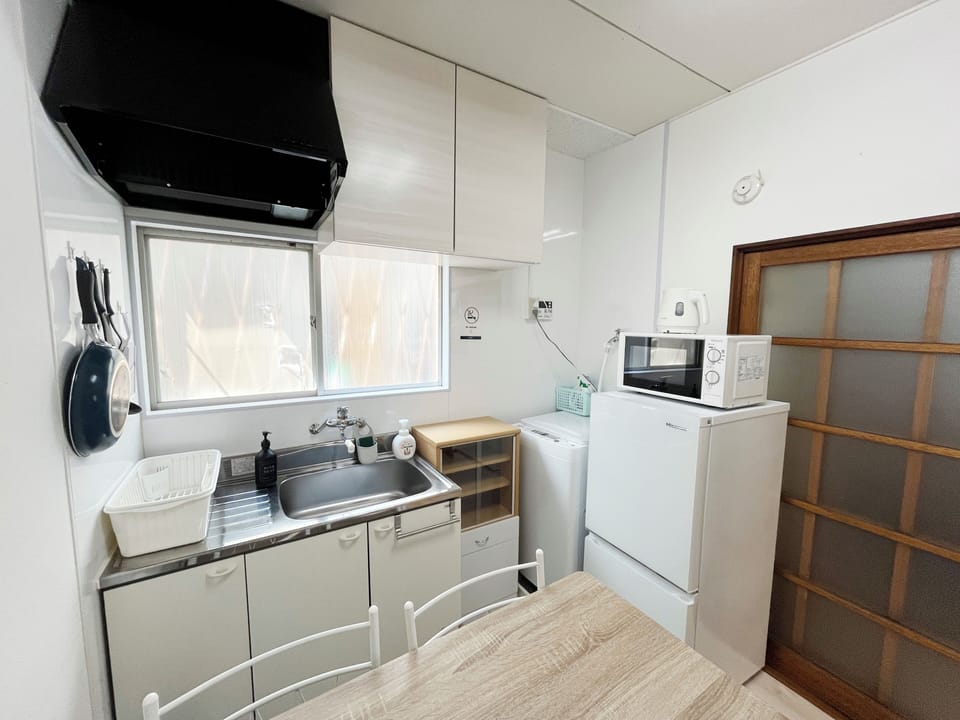 Family House, Balcony | Private kitchen | Fridge, microwave, stovetop, cookware/dishes/utensils