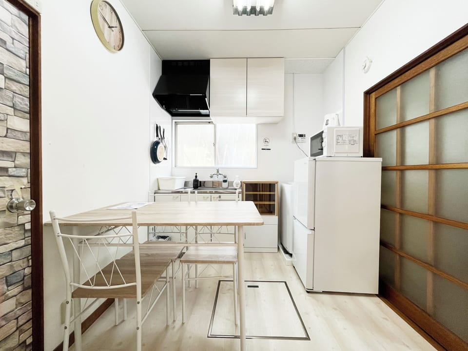 Family House, Balcony | Private kitchen | Fridge, microwave, stovetop, cookware/dishes/utensils