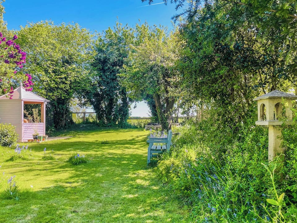Relax in your own private haven listening to birdsong. | Amphlett Cottage, Bredon, near Tewkesbury