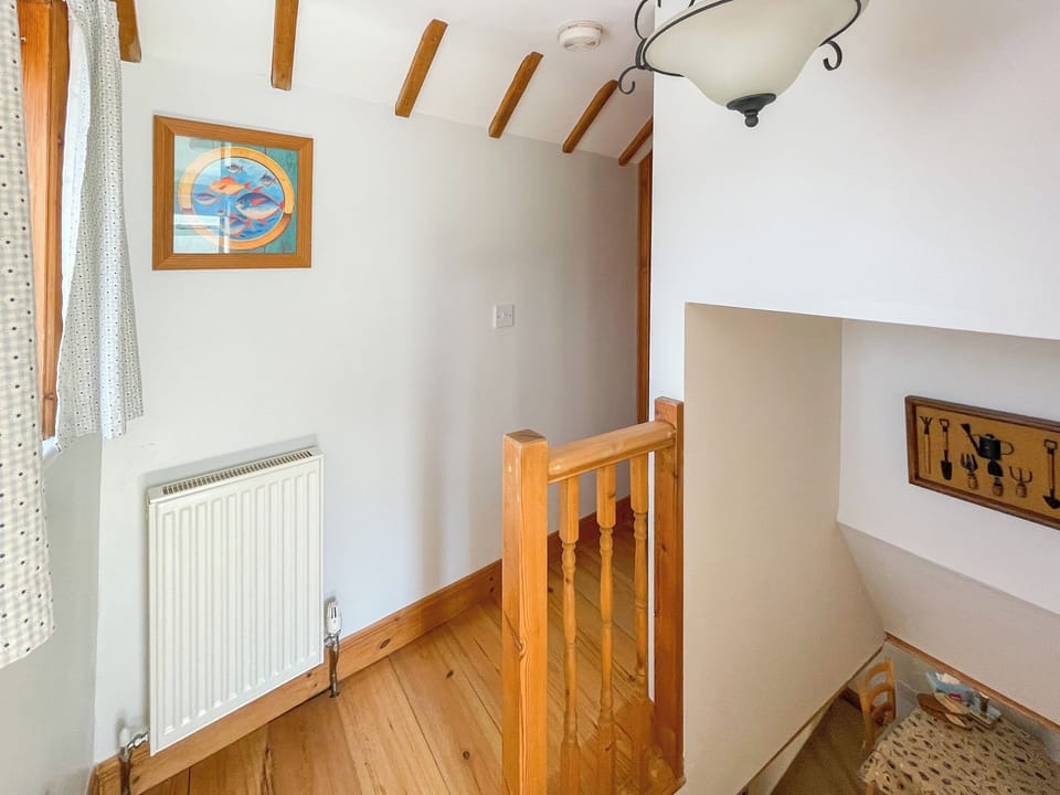 Landing - route to bedroom | Chapel Cottage - All Seasons Cottage Breaks, Saxmundham