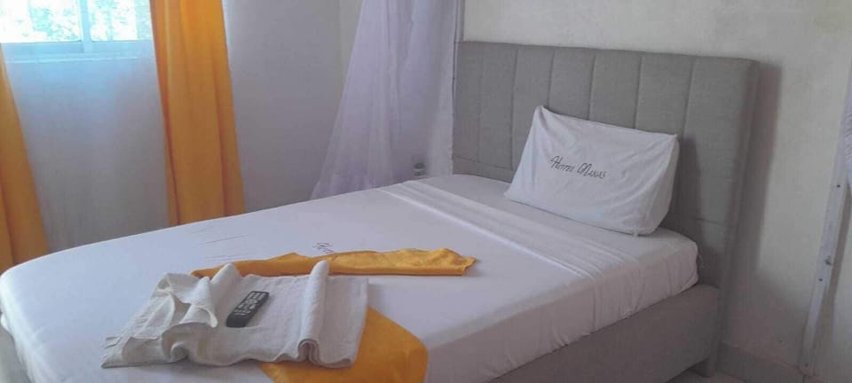 Deluxe Single Room | Free WiFi, bed sheets