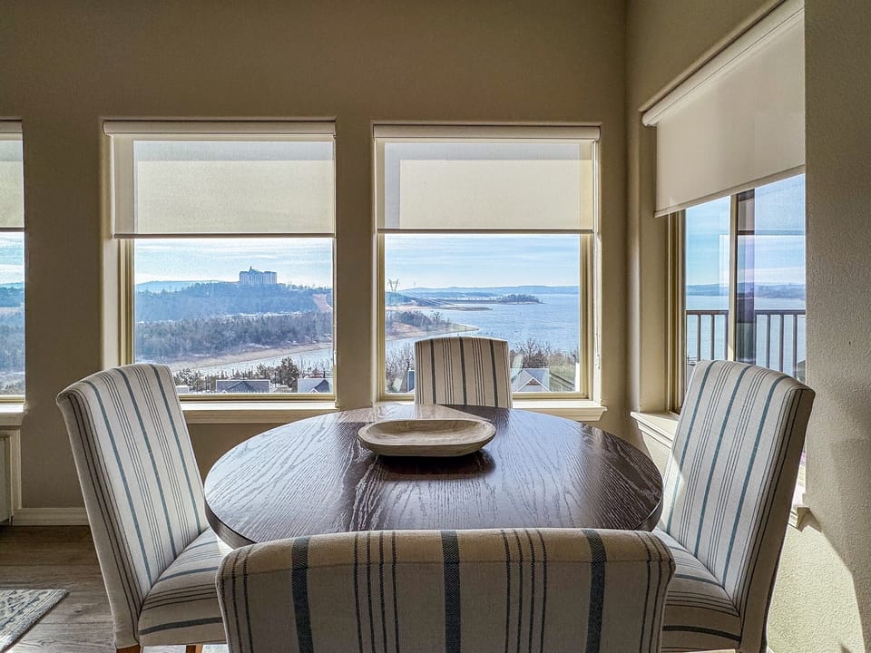 Sunroom dining table to eat or play games that are provided in the penthouse