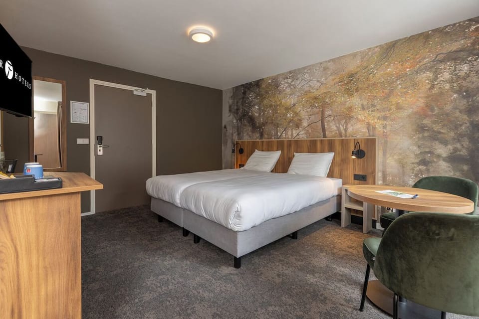 Unwind in a serene room with cozy seating nook.