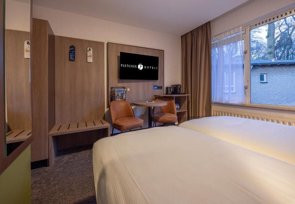 Settle in with roomy storage, TV, and cozy seating nook.