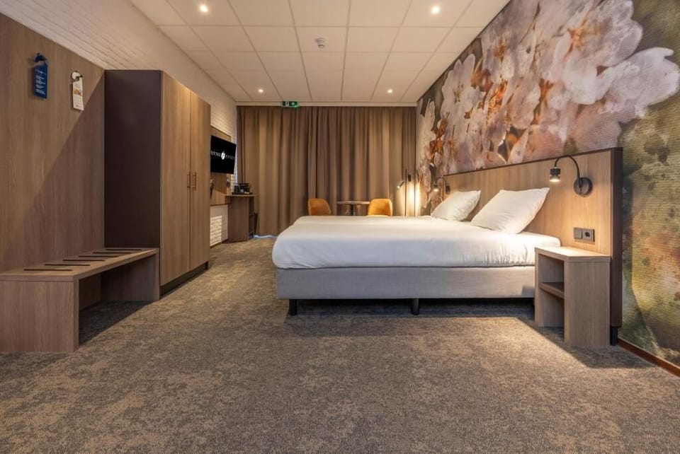 Relax in a generous king bed with boutique-hotel comfort.