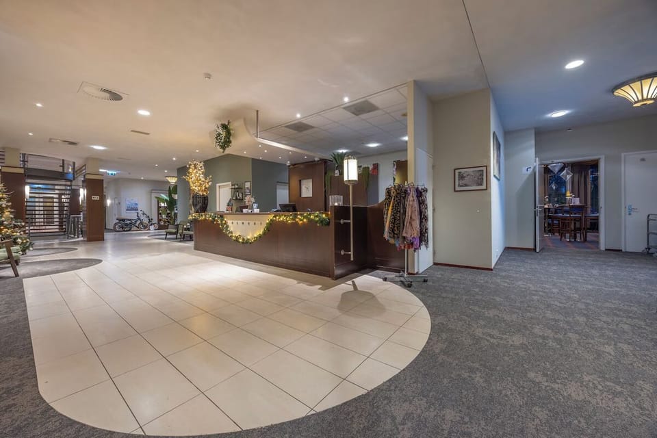 Stroll through airy reception spaces with comfortable seating nooks.