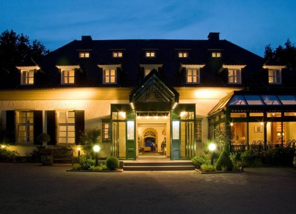 Arrive to a warmly lit entrance for an elegant stay.