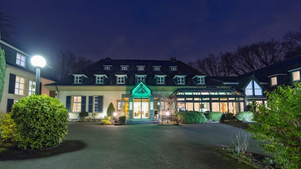 Unwind under evening lights in a peaceful, welcoming setting.