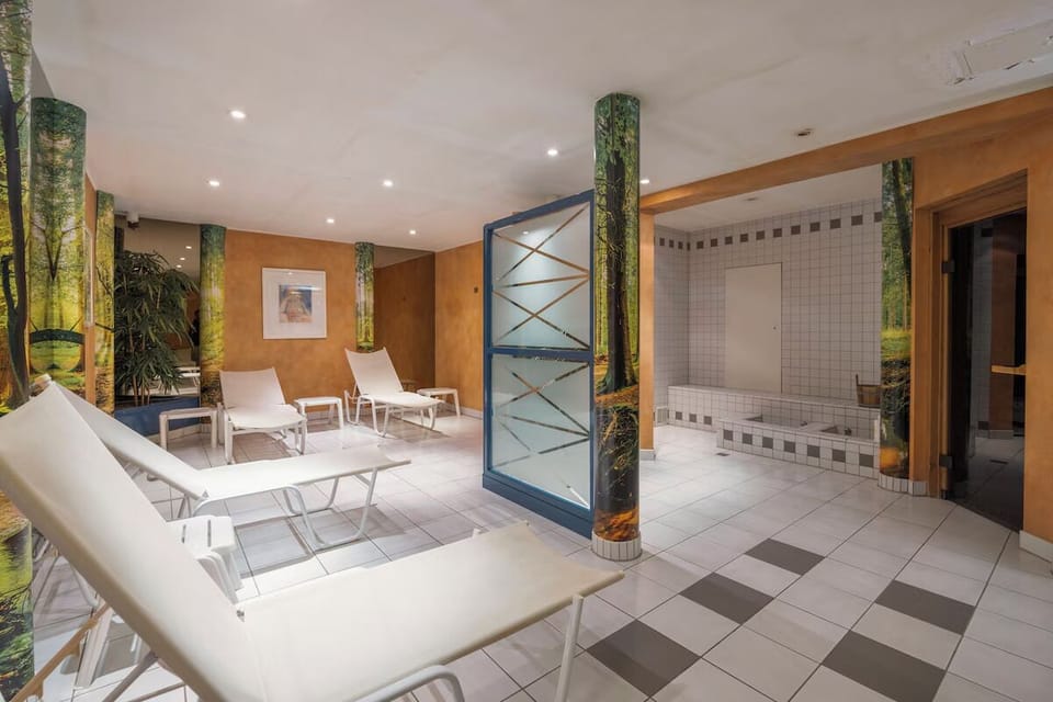 Unwind on loungers in a serene spa retreat.