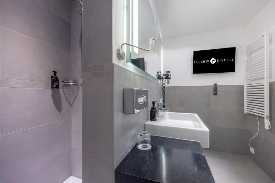 Start your day in a modern bathroom with spa-like simplicity.