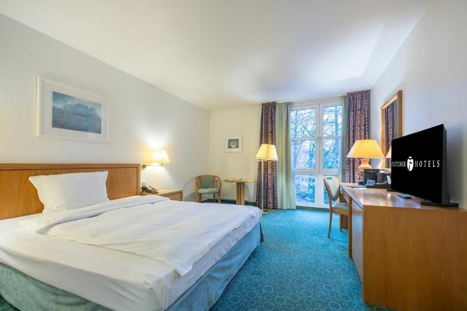 Lounge comfortably in a spacious room with inviting seating.