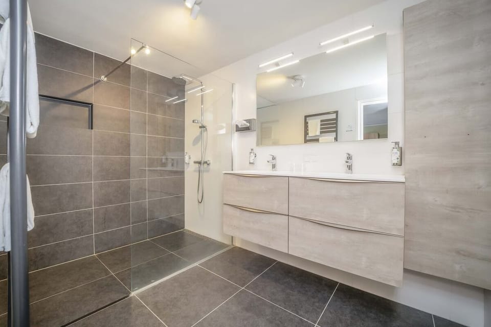 Start the day with space to spread out at the double vanity.