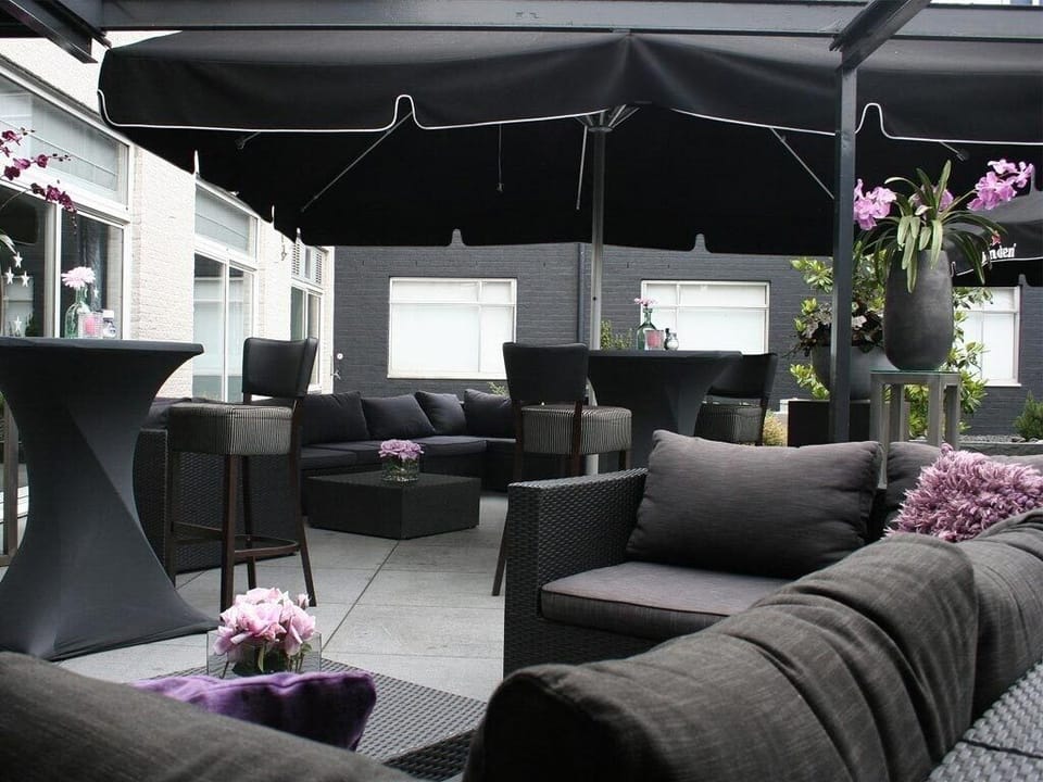Lounge with friends under the canopy, sheltered and cozy.