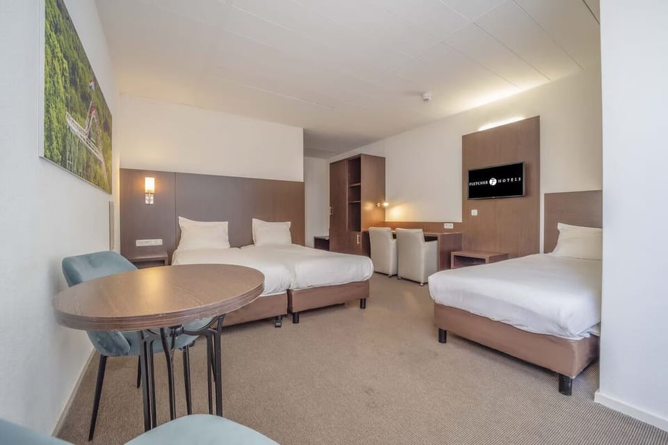 Relax in a roomy triple setup with lounge seating.